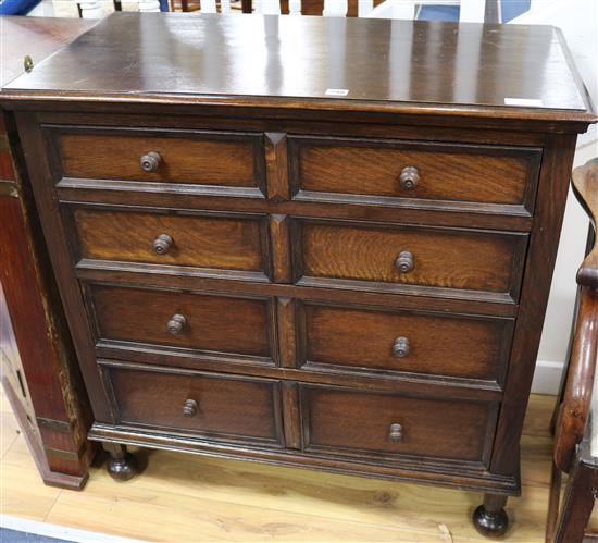 An oak five drawer chest W.91cm
